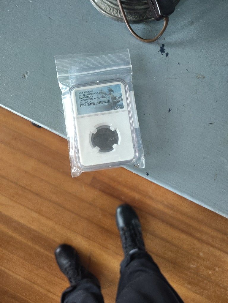 pirate Coin 1655 graded like new sealed