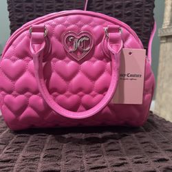 Juicy Couture Flawless Dome Satchel in a vibrant pink faux leather