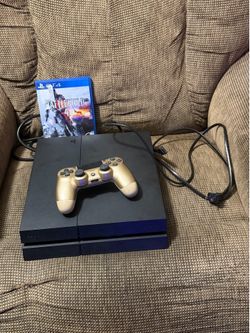 Sony PlayStation 4 Console with Controller and Game