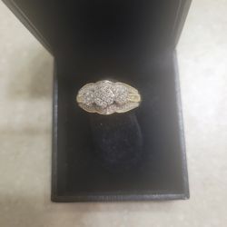 10 K Gold Diamond Ring.  Weight Is 3.4 Grams 