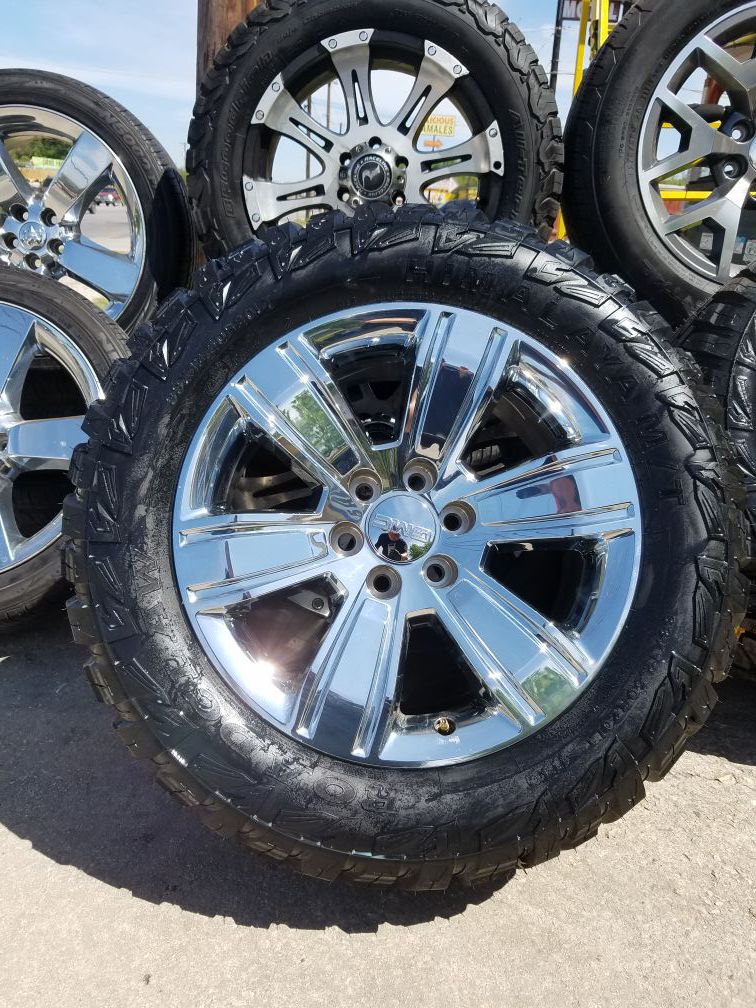 20" Gmc chrome Oem wheels on a set of 33" Mts