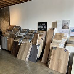 Waterproof SPC vinyl planks + laminate flooring in stock! $1.39