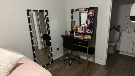 Vanity with a lighted mirror