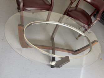 2 Chairs With Wheels and Center Coffee Table