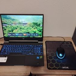 Victus by HP 15.6 inch laptop with mechanical keyboard, mouse, and mousepad
