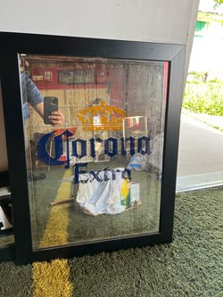 Corona mirror and sign