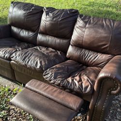 Dark Brown Leather Reclining Sofas - 1 Large and 1 loveseat