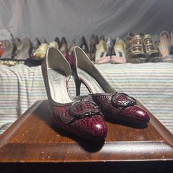 Size 8.5M Franco Sarto Red Croc Embossed Heels with Buckle Detail.