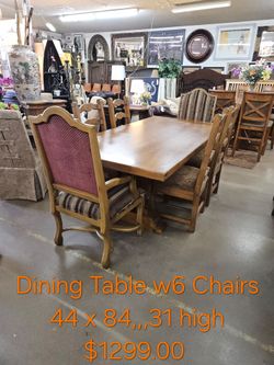 Wood Dining Table with 6 Chairs We are located at 2811 East Bell road. Another Time Around Furniture.
