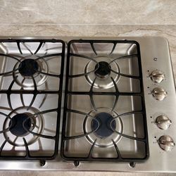GE 30-in 4 burners Stainless steel Gas Cooktop