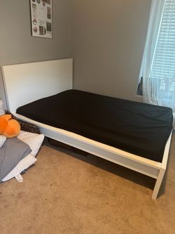 White IKEA Queen size bed frame with headboard
