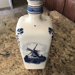 Vintage Delft blue cork bottle decorated with flowers and windmill