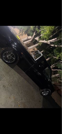 Black SUV with Chrome Wheels
