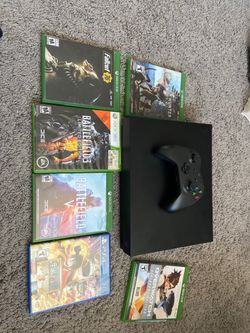xbox one x with 6 games