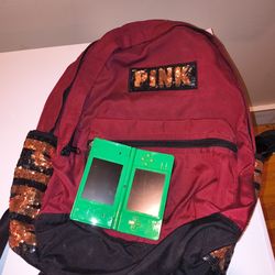 Pink book bag and Nintendo ds