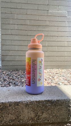 Lululemon pink sunset colored insulated water bottle