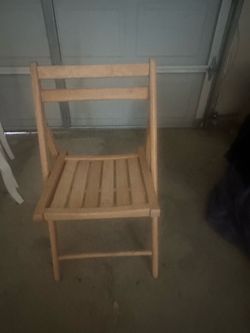2 wooden folding chairs