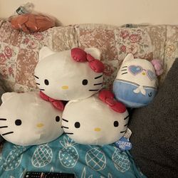 Hello Kitty Face Cloud Pillow (3) and Squishmallows Hello Kitty Blue Sailor Plus