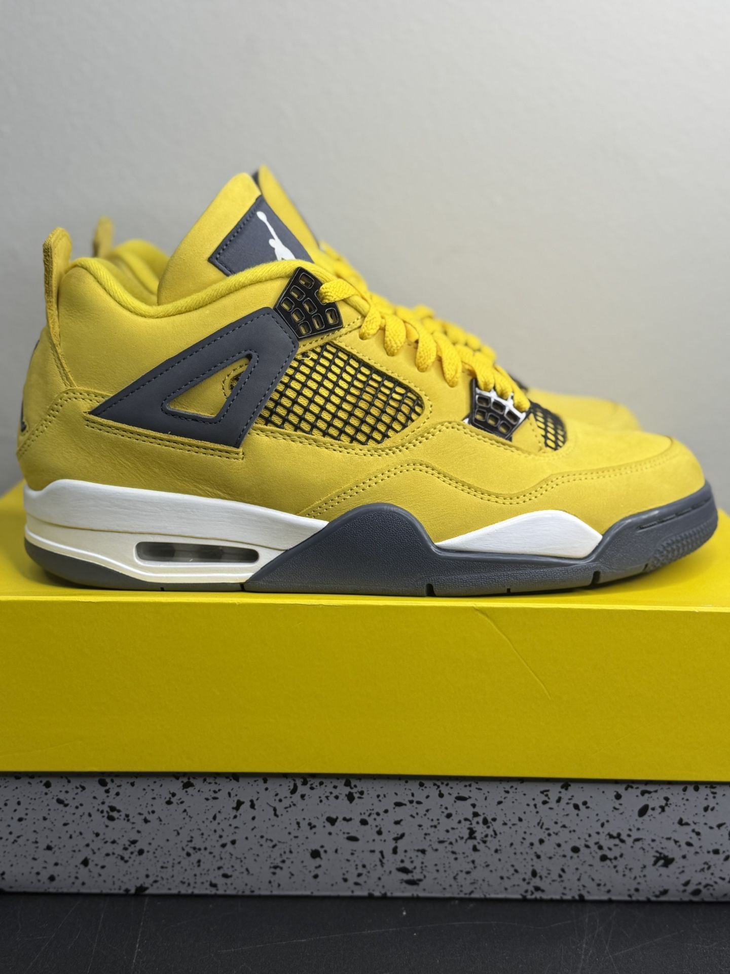 Air Jordan 4 “Lightning” Size: 10M/11.5W (Lightly Worn With Minor Flaws)