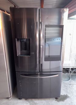 Samsung Dark Stainless Steel Refrigerator And Freezer