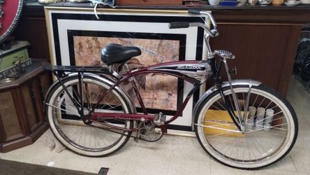 26" Schwinn Cruiser Deluxe tank bike Reproduction in great riding condition some rust on chrome not horrible can clean up