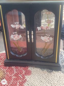 Glass jewelry box with black frame