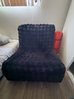 Black couch single seat