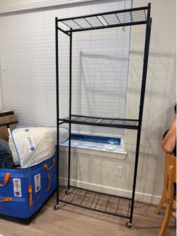 Garage storage rack with wheels