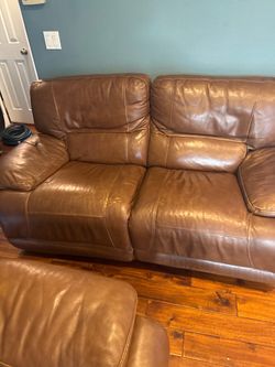 Brown Leather Reclining Sofa and Loveseat Set