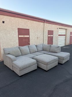 WITH DELIVERY Gray Sectional couch with Ottoman
