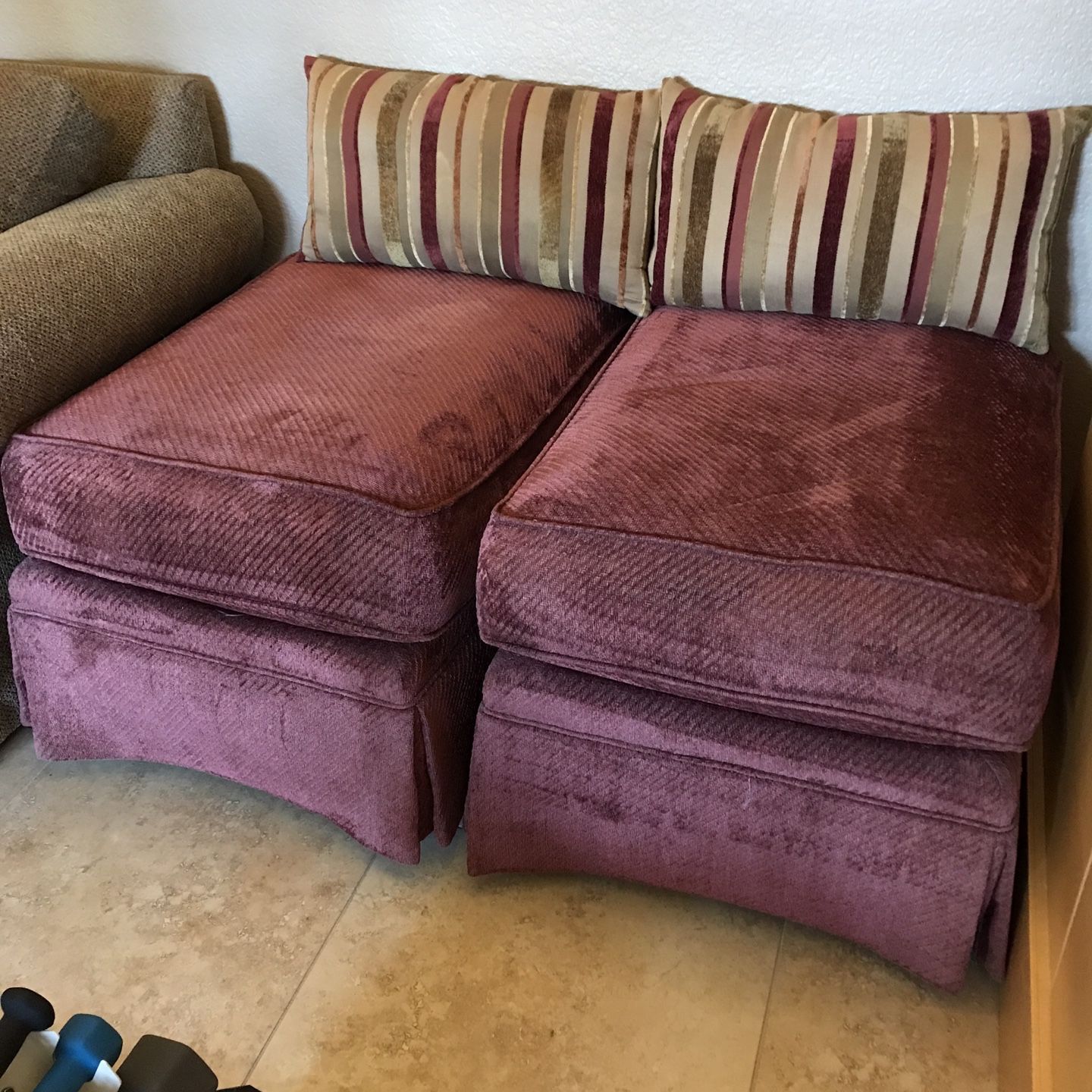 2 Wine-Colored Skirted Ottomans And Pillows