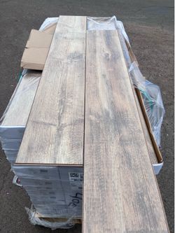 Home Decorators Rebel Trail Pine Rustic Brown 10 mm T x 8 in. W Waterproof Laminate Wood Flooring