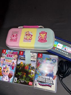 Nintendo Switch with Games and Carrying Case