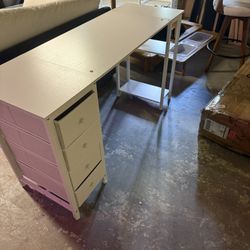 White 4 Drawer Desk With Minor Damage On The Top