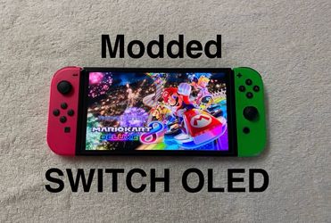 NINTENDO SWITCH OLED with 125 NEWEST SWITCH GAMES