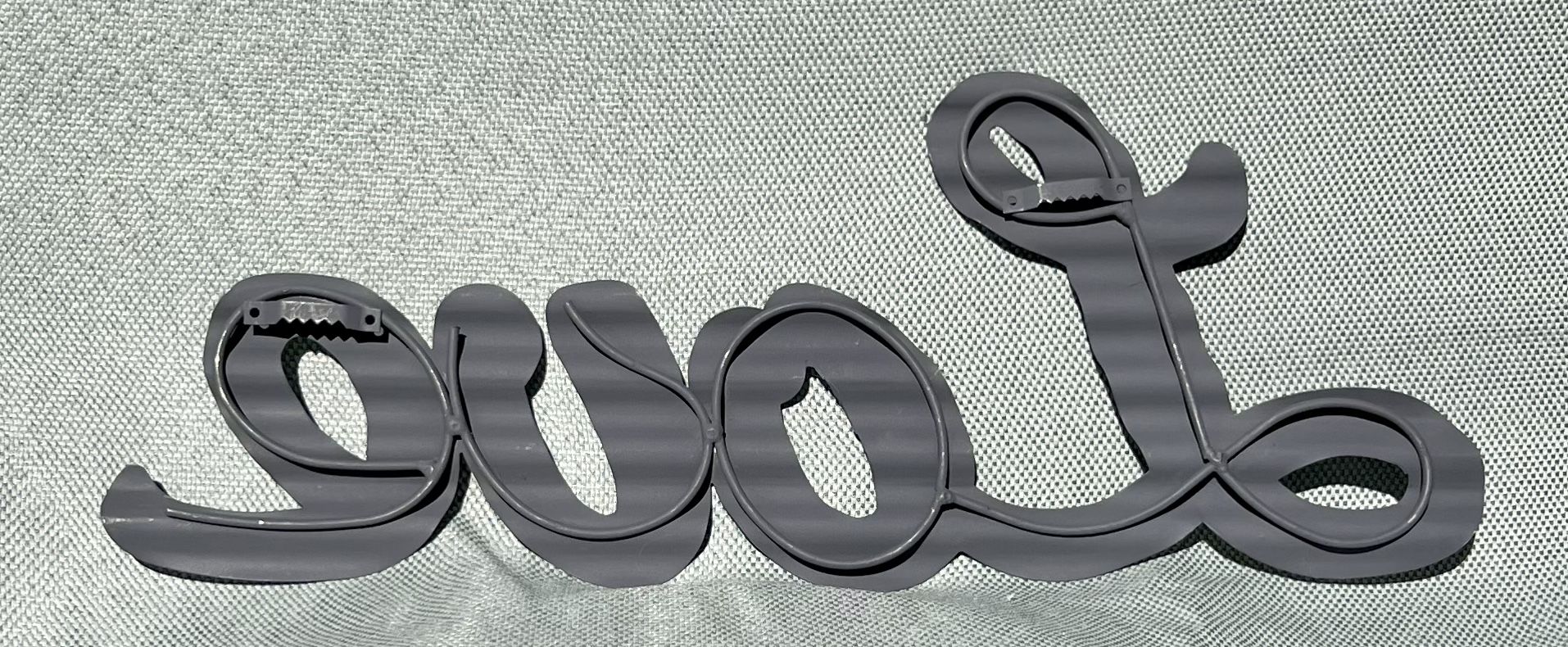 Cursive Love Sign