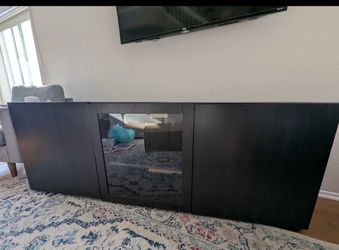 IKEA BESTÅ TV unit in black-brown, 71" W x 26" H x 17" D.