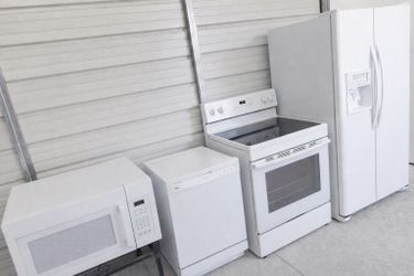 One year old Refrigerator stove dishwasher and microwave