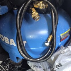 Cordless Saw And 2Batterys And Charger And A Air Compressor 