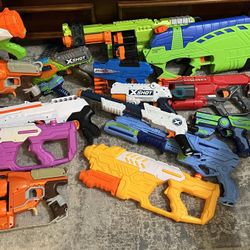 A Lot Of Nerf Guns And Water Guns