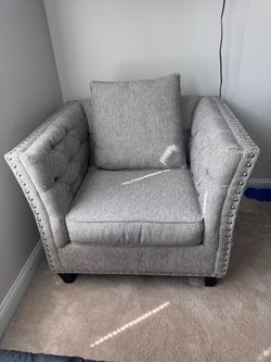 Gray Tufted Accent Chair with Nailhead Trim