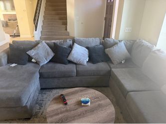 Gray U- shaped sectional - Living Spaces