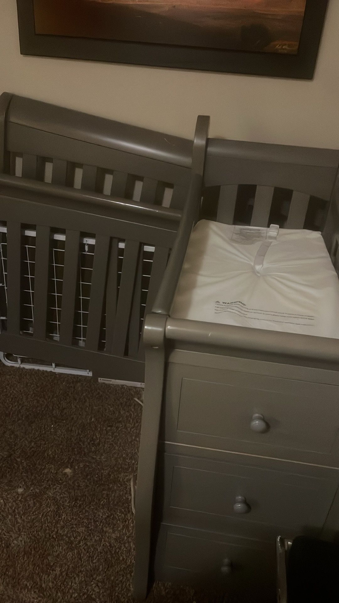 crib and changing station for baby