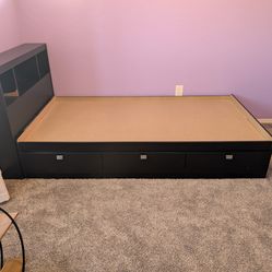 Twin bed frame with bookshelf headboard