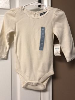 NWT 2 Baby Gap shirt with lace trim size 6-12 month cream and coral. Free body wash sample