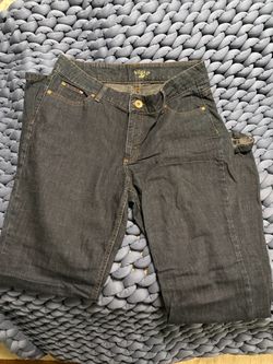 Relaxed fit women's jeans from Riders by Lee. Classic five-pocket styling with subtle contrast stitching.