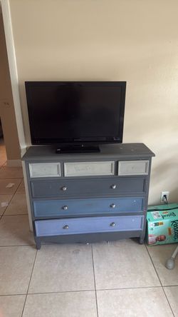 Tv and cabinet