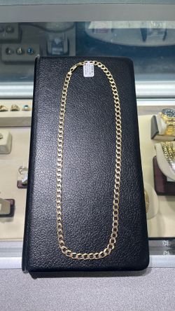 10k curve necklace