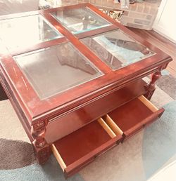 Wood coffee table with glass