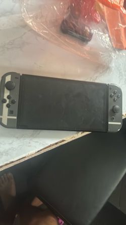 Nintendo Switch with Gray Joy-Cons comes with animal crossing slight tear on joy con doesn’t effect gameplay tho